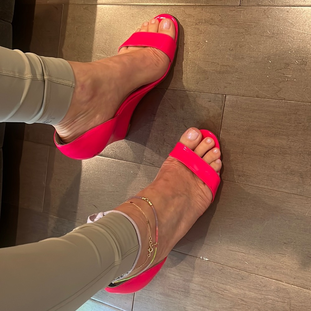 Christian Louboutin’s Neon Pink Patent Leather wedges